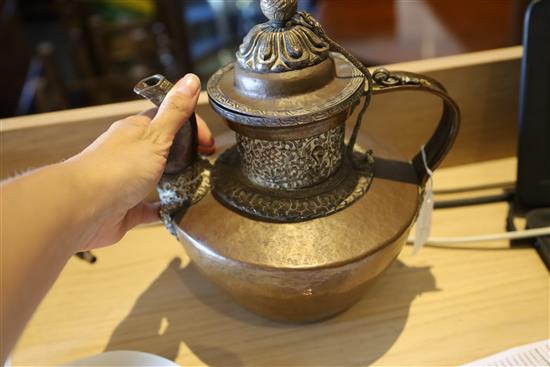 A Tibetan copper and silver teapot, 19th century, H. 26.5cm